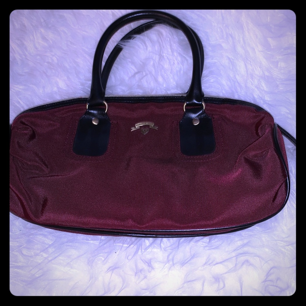 Victoria’s Secret burgundy handbag.